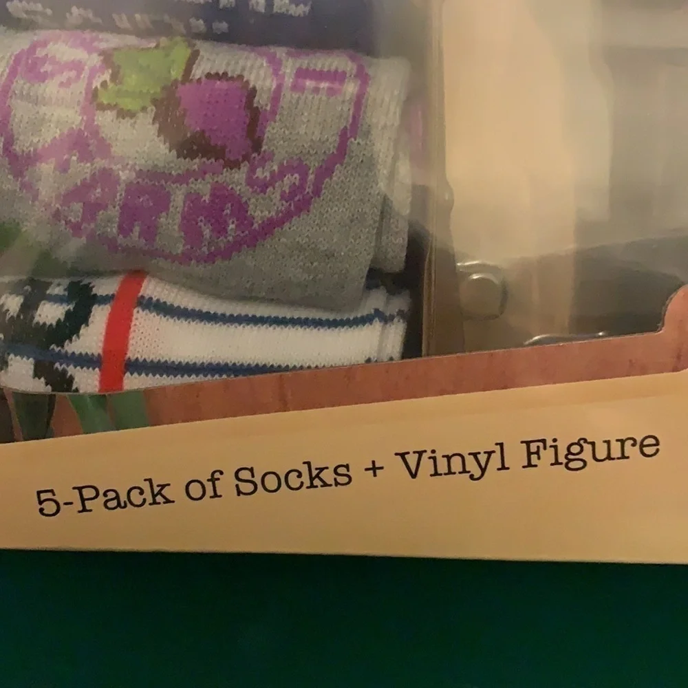 The Office set of five packs of socks and vinyl figure